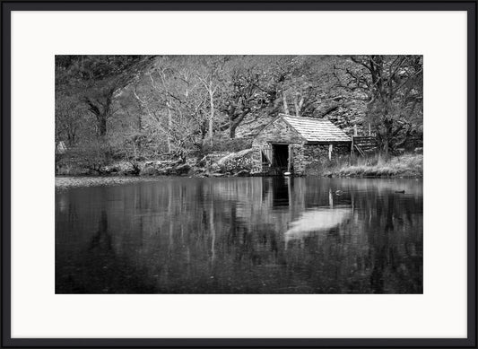 A Small Boathouse on Waters Edge