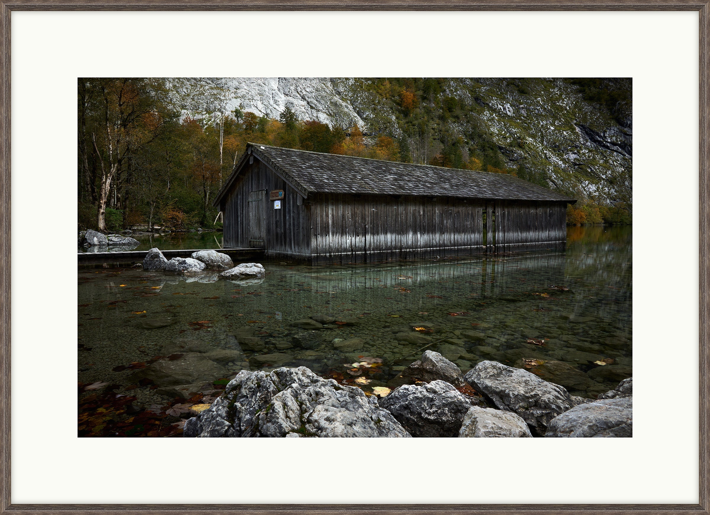 Romantic Boathouse in Calm Mountain Lake